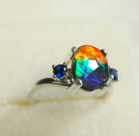 Ammolite Ring with blue Sapphires.Faceted Rainbow ammolite gem