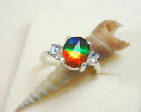 Ammolite jewelry ring  four color ammolite with Tanzanites.Size 7.