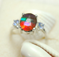 Ammolite Ring with Tanzanites.Faceted with RARE pink.Perfect gift.Size 7