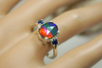 Sterling silver Ammolite Ring size 8 with sapphires.The perfect gift.