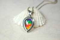 Sterling Silver Ammolite Pendant of many colors.The perfect gift for her
