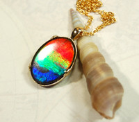 Ammolite pendant in solid 14k Gold.Four color rainbow.The perfect gift.