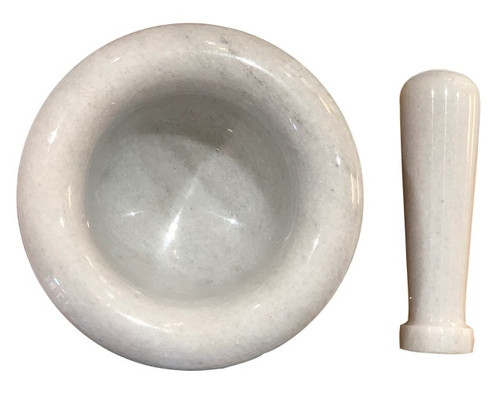 white marble mortar and pestle