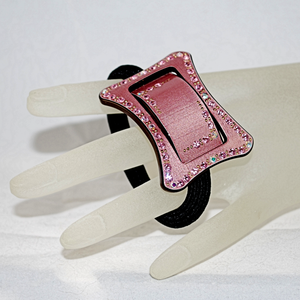 Full view of pony tail holder on hand model