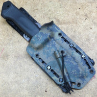 Gerber LMF II Survival Grizzly Elite sheath set up for MOLLE Gear.  