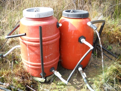 Double-Action Settling Tank using two pickle barrels double-pickle-barrel-settling-tank.jpg
