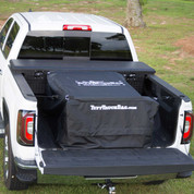 Back view of a black waterproof Tuff Truck Bag with the pickup truck tailgate down for full viewing