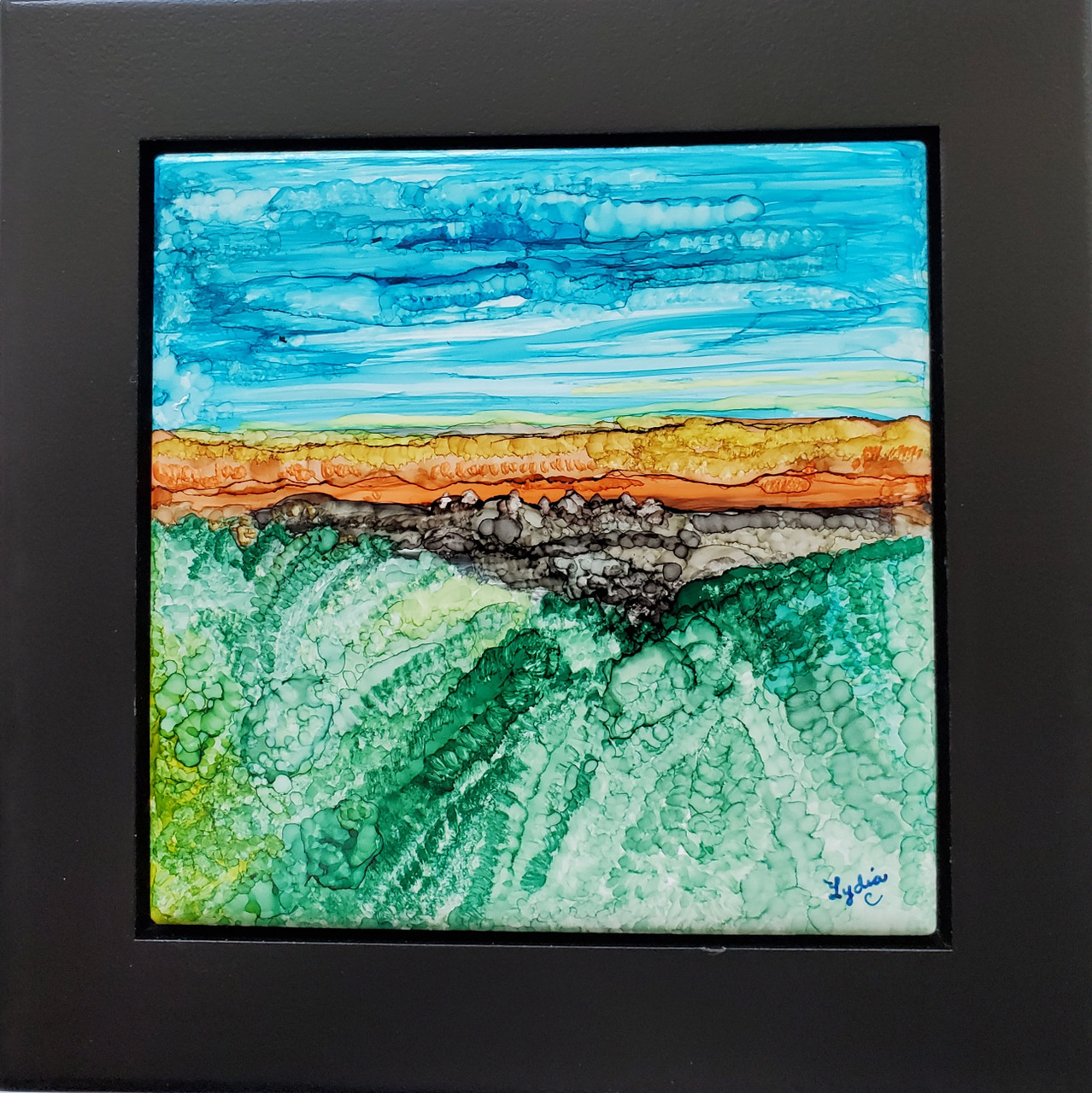One of a kind framed ceramic tiles painted with alcohol inks showing a