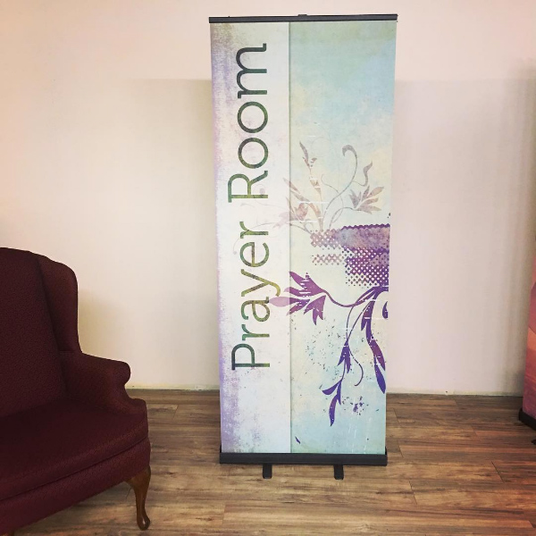 prayer banner on retractable stand