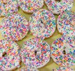 Rainbow Sprinkle White Icing Donuts