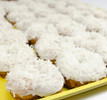 Coconut White Iced Cake Donuts