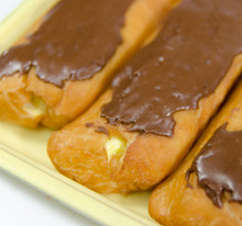 Chocolate Covered Custard Donuts
