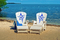 The Little Torch - Adirondack Set comes with two chairs with your choice of designs on each chair, along with two ottomans.