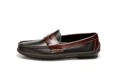 Side view, men's handsewn Penny Driver Loafer in black/brown leather.