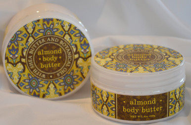 Almond Body Butter is 8.99 each. Photo is of two, showing top and side profile. 