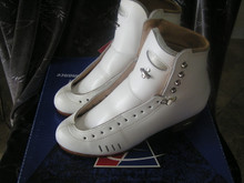 Riedell Elite HLS 1500 Ladies Skating Boot

Traditional boot design fuses with modern technology and must-have comfort features to create the one and only HLS 1500. Its elegant styling combined with a triple laminated comfort tongue for support and shock-absorbing soles for precision landings offers the best of both worlds.

Unique to this boot! Heel Lock Stabilizer keeps heels in place to increase control.
Highlights:
Triple laminated comfort tongue offers unmatched support
Shock-absorbing leather/cork soling system improves landings
Triple quarter reinforcements for extra firm support
Lined with hand-selected, treated top grade leather
Dual-density quarter padding supplies comfort where you need it most
Expertly crafted in Red Wing,.


Never had blades mounts - brand new

Discontinued Model