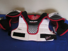 The Bauer Lil Rookie Hockey Shoulder Pads are specifically designed for the little guys. Bauer has designed the lil rookie shoulder pads to keep the kids safe while offering enough mobility to help them build their skills.  

Model Number: 1035324
Heritage: New
Level of Play Guideline: Recreational
Bauer Sizing Guideline:
Shoulder Pad Size / Player Height / Chest Circumference
YTH XS / 3'0'' – 3'10'' / 21'' – 25''
YTH SM / 3'3'' – 4'1'' / 22'' – 26''
YTH MD / 3'7'' – 4''4'' / 23'' – 27''
YTH LG / 3'9'' – 4'7'' / 24'' – 28''