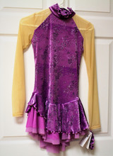 Mondor Model 12920 Velvet Skating Dress

Glitter velvet dress with mesh sleeves and shoulders
Mock neck
Asymmetrical classic skirt doubled with mesh
Matching hair tie included

Fabric:
90% polyester, 10% elastaneMesh: 82% nylon, 18% elastane