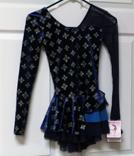 Mondor Model 2971 Girls Skating Dress

Asymmetrical dress, full skirt doubled with mesh, mesh sleeve and neckline, shelf bra, hair tie included. 