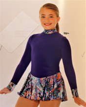 Mondor Model 4403 Polartec Skating Dress Mondor Polartec long sleeve dress, fully lined mock neck and wrists, glitter motif fabric accent, zipper back, hair tie included.
