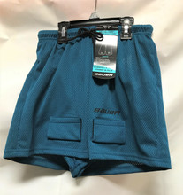 Bauer Mesh Jill Shorts - Girls

100% Polyester
Santized® technology prevents bacteria growth
Ergonomically engineered foam insert for player comfort and protection
3-D hook and loop sock adjusters
Adjustable draw cord at front waist