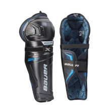 Bauer X Intermediate Hockey SHin Guards

The Bauer X Shin Guard has a newly injected shin cap and a new ErgoDynamic Lab kneecap giving you a deeper fit for better overall feel and optimal protection. Speaking of protection, Bauer uses MD foam in the knee wing and thigh protector, and a full coverage calf with a PE insert.

The Bauer X shin guard includes an anchor strap for the attachment system. This strap helps to secure the shin guard to your leg which ensures the protective features will stay in place, an important feature for every player. This strapping system also provides good comfort.