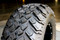 12" BATTLE Matte Black Wheel and 23" EFX Hammer All Terrain Tires