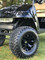 12" BLACKJACK Gloss Black Aluminum wheels and 23" All terrain tires combo