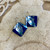 #25  Blue Flower Painter Earrings (Temporarily not in stock)
1.5"  x 1" Silver Wire
$58.   1 in store