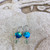 #5D Turquoise Dancing Leaves Aurora Earrings  $45
Teal & Purple Flower Earrings
Niobium, Swarovski Crystal, Gold Overlay Ear Wires
1 1/4"  x 1/2"   