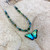 #15 Green Flash Butterfly Necklace $75

Niobium
• Swarovski crystal
• Bohemian glass
• Silver  overlay chain
• Adjustable: 18-20" long
• Drop: 3/4" l. x 1" w
