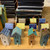 brown standing bird house in the back of left row of 3 birdhouses is sold