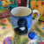 Hand-thrown Black Portuguese Water Dog with White Bib Ceramic Dog
Handmade in the USA