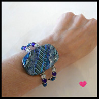 ICE BLUE FUSED GLASS MEMORY WIRE CUFF
HANDMADE IN THE USA