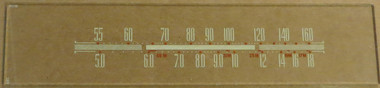Dial image taken against a tan/brown background to better illustrate off-white dial print. Dial glass is clear other than scale print.