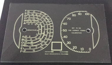 Dial photo take against a dark background to illustrate print - glass is clear other than printing
