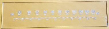 Dial image taken against tan background to illustrate white print. Glass is clear other than white print.