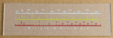 Dial image taken against a tan background to illustrate white print. Dial is clear glass other than the scaling printing.