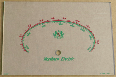 Dial image taken against a tan background to illustrate scale printing. Dial is clear glass other than printing.