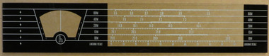 Dial image taken against a tan/brown background to better illustrate white portion of dial scale print. Dial glass is clear other than the black and white dial print.