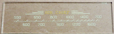 Dial image taken against a tan background to better illustrate off-white dial print. Dial glass is clear other than scale print.