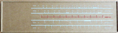 Dial image taken against a tan/brown background to better illustrate white portions of dial scale. Dial glass is clear other than the scale printing.