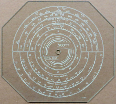 Dial image taken against a tan/brown background to better illustrate off-white dial scale print. Dial glass is clear other than dial print.