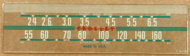 Dial image taken against a tan/brown background to better illustrate off-white aspects of dial scale. Dial is clear glass other than scale print.