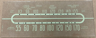 Dial image taken against a tan/brown background to better illustrate dial print. Dial is clear glass other than the dial scale print.