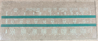 Dial image taken with light gray/tan background to illustrate lighter print - glass is clear other than printing.