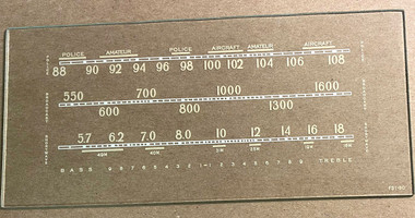 Dial image taken against tan/brown background to illustrate  light color dial print - dial is clear glass other than dial scale printing