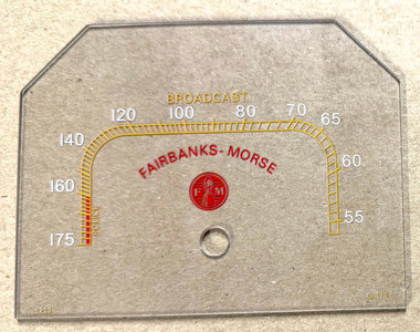 Dial image taken against a tan/brown background to better illustrate light portions of dial scale. Dial is clear other than scale print.