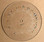 Image taken against a tan/brown background to better illustrate light color portions of dial. The dial is clear other than scale graphics.