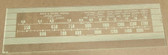 Dial image taken against a tan background to better illustrate light color dial scale. Dial glass is
clear other than dial scale print.
